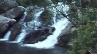 Two gay guys by the waterfall - porn video